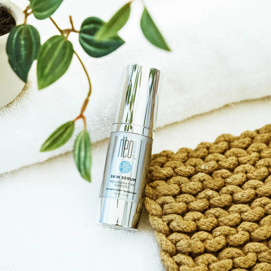 NeoGenesis Skin Serum Next to Woven Blanket and Vine