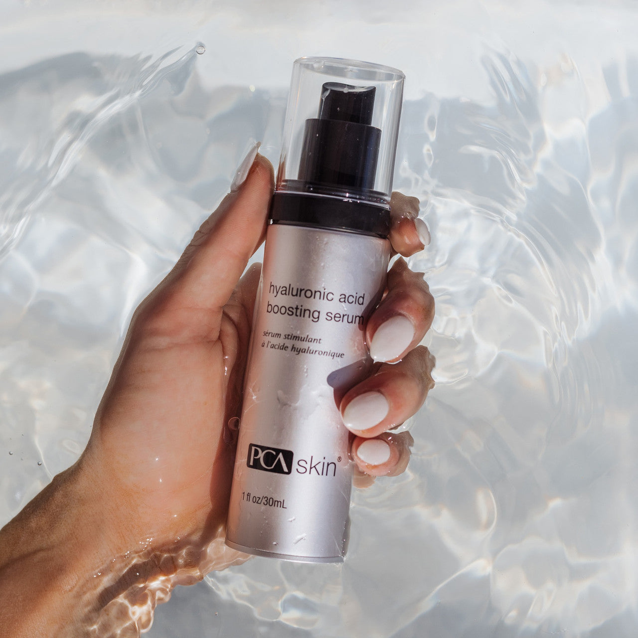 PCA Skin Hyaluronic Acid Boosting Serum in Hand