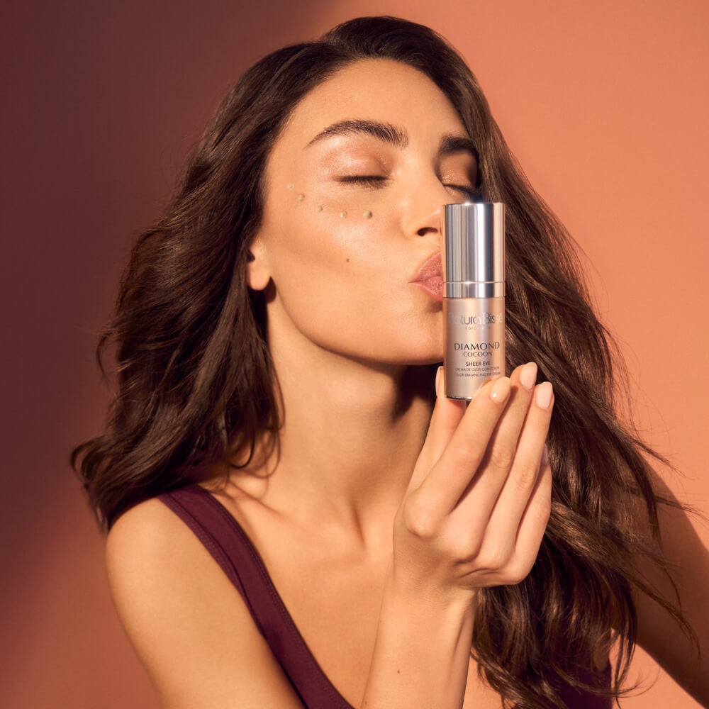 Model Holding Natura Bissé Diamond Cocoon Sheer Eye - Skin Elite