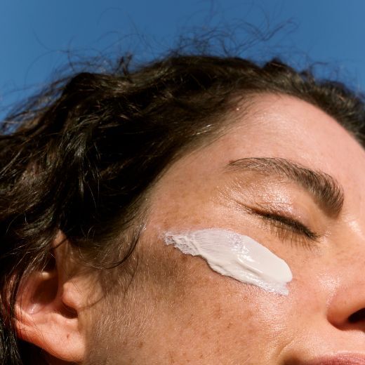 Woman with Sunscreen on Cheek
