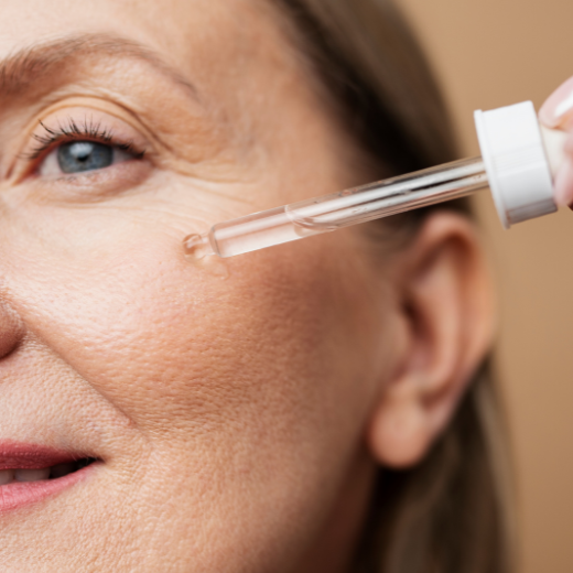 Image of model applying Retinol to their face