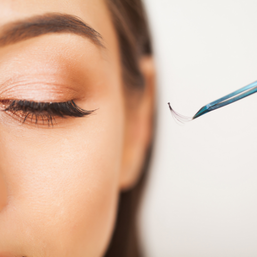 Woman getting eyelash extensions