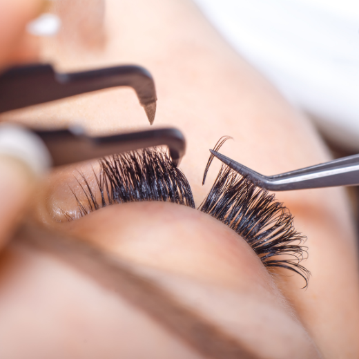 Woman getting eyelash extensions