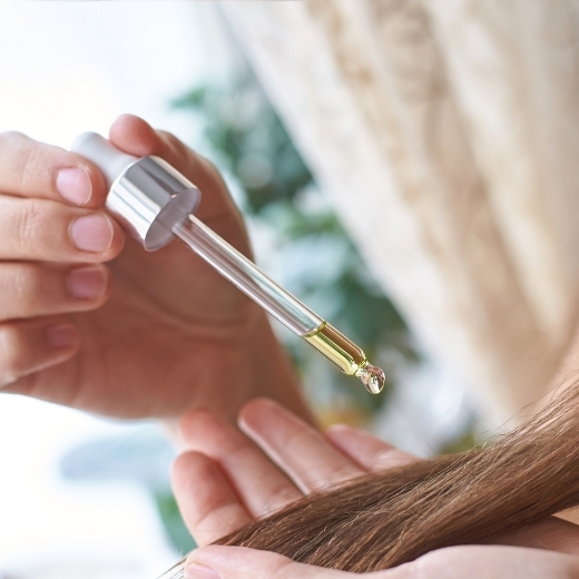 Applying hair oil