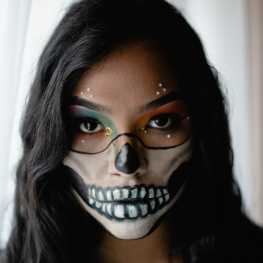 Woman with face painted for Halloween