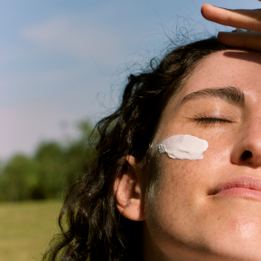 Image of model with sunscreen on their face