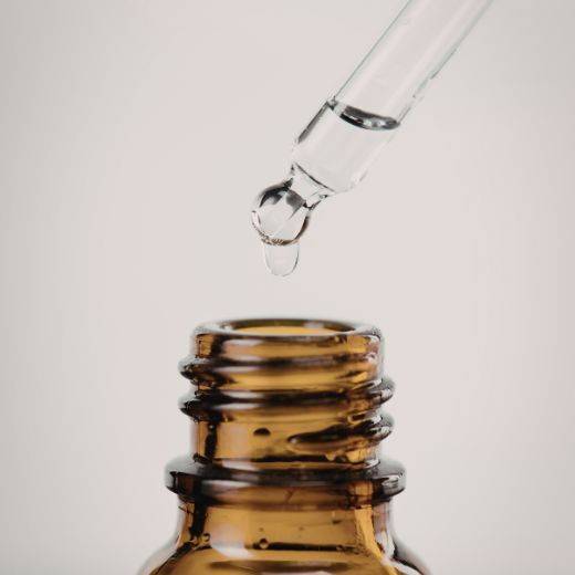 Skincare Serum bottle open with dropper