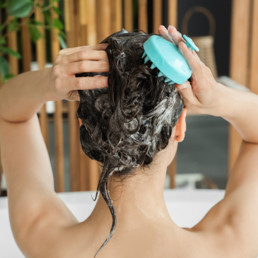 Image of model washing their hair