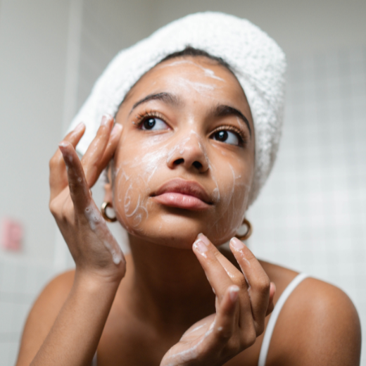 Woman Washing Face After Swimming